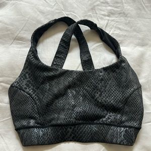 IVL sports bra snake skin pattern.